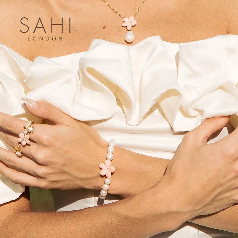 Pearl & Lily Flower Charm Enamel Bracelet - SAHI London | Handcrafted Jewellery Handbags & T-shirt Fashion